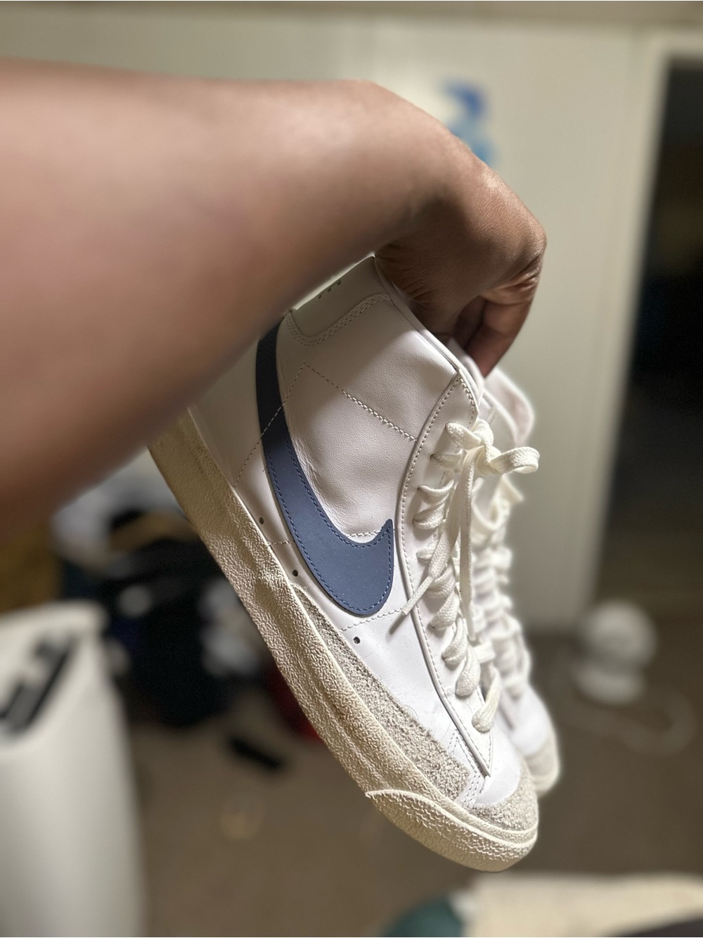Nike Men’s White Leather Sneakers with Blue Swoosh Accent